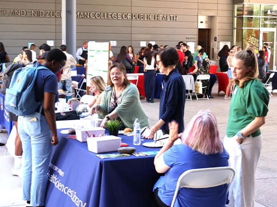 Student at resource table during the 2024 College Mixer