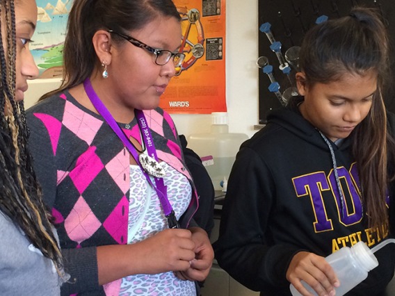 TOCC students working together in lab