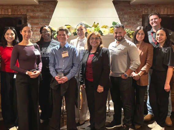 Dean Hakim with alumni group at the 2025 DC Alumni Reception