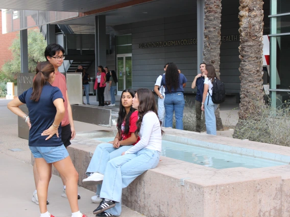 students talking outside college