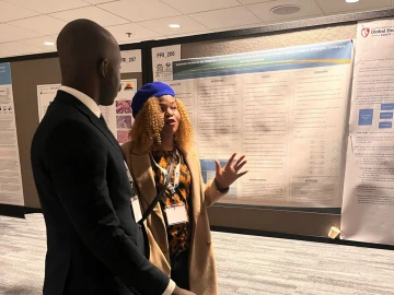 Uzoamaka Okwor presenting her research at CUGH