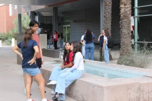 students talking outside college