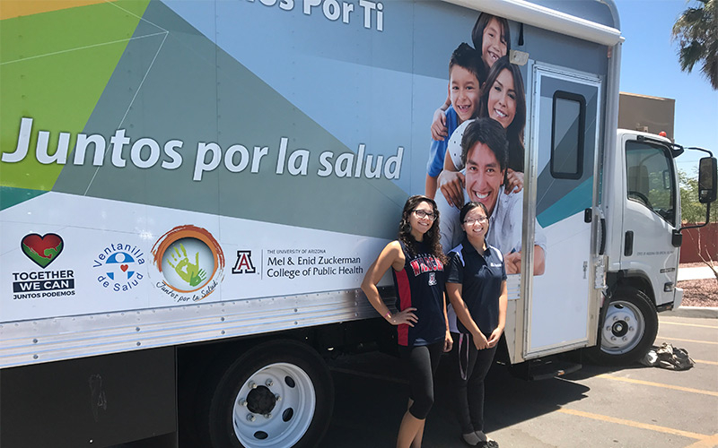  program, “Juntos Por la Salud” (Together For Health) Primary Prevention Mobile Unit, offers free health screening services and travels to communities in Tucson with the help of students. From left, Camille Gonzalez, a graduate student from the UA Mel and Enid Zuckerman College of Public Health and Yvonne Mei, an undergraduate student in the nutritional sciences program at the UA College of Agriculture and Life Sciences.