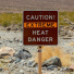 "Heat Danger" sign in the desert